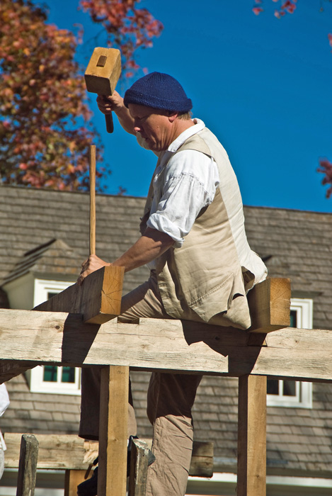 Jack sets and pegs one of the joists.