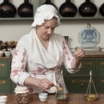 Measuring ingredients at the apothecary