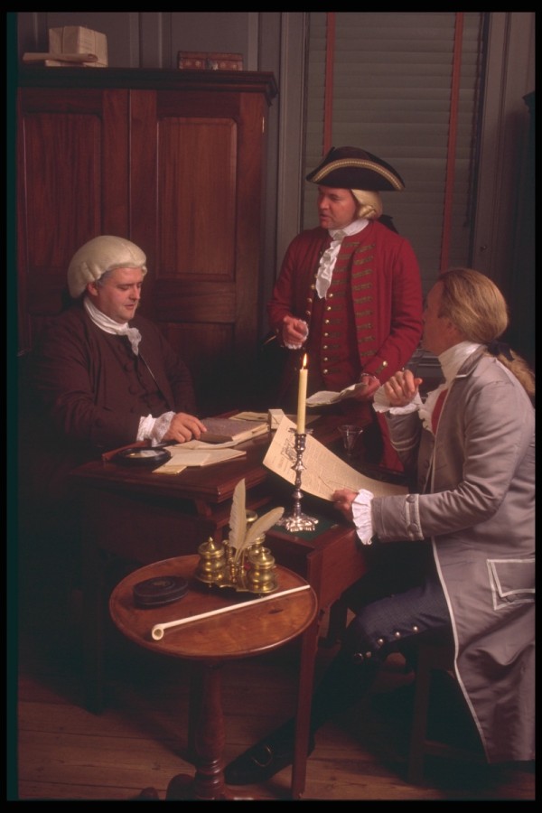 Peyton Randolph, portrayed by Wayne Moss, talks with his brother, John, and Thomas Jefferson.