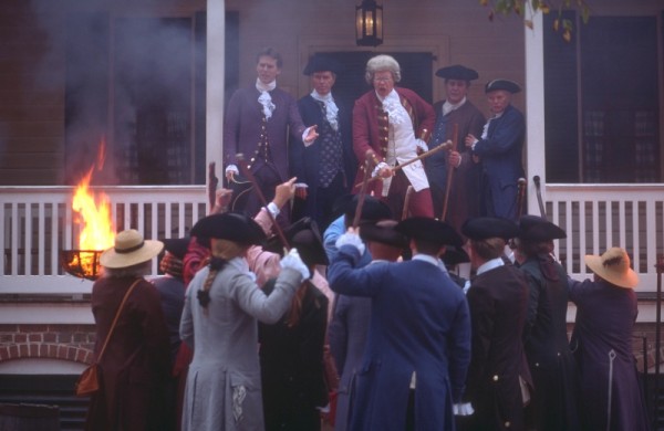 Francis Fauquier, center, portrayed by Charles Eugene Bush, tries to calm a crowd that's enraged by the Stamp Act.