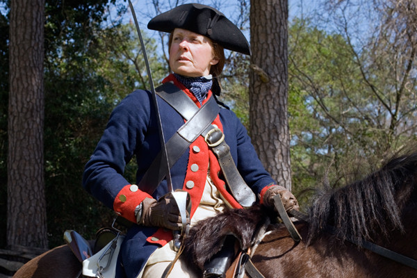 Joyce Henry on horse (Pete) in soldier's uniform