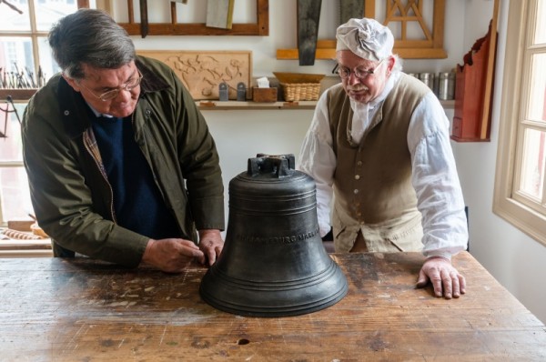 The author and Joiner David Salisbury inspect the newly arrived Market House bell.