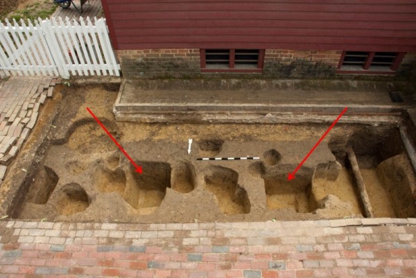 These two substantial postholes are part of an "earthfast" building that pre-dates Wetherburn's Tavern. 