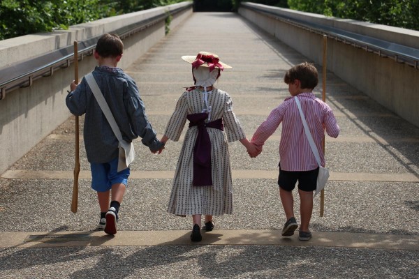 kids-holding-hands-bridge