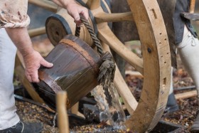 Once the rim is firmly in place, it is doused with water. 