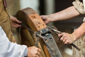 Because the work must be done quickly,  holes are ready to receive the bolt-like nails.