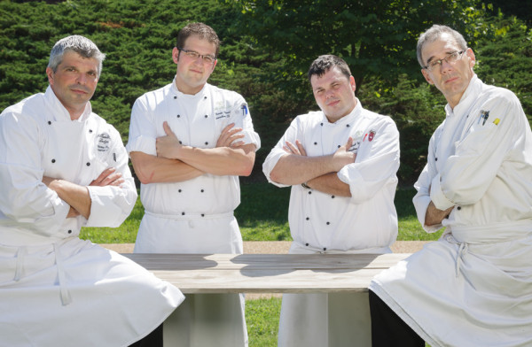 Colonial Williamsburg Chefs Prep for Taste Tradition Brew ‘N Cue Showdown at the Williamsburg Lodge. Anthony Frank, Travis Brust, Scott Watson, and Rhys Lewis