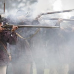 The 2nd Virginia militia firing guns at Great Hopes Plantation.