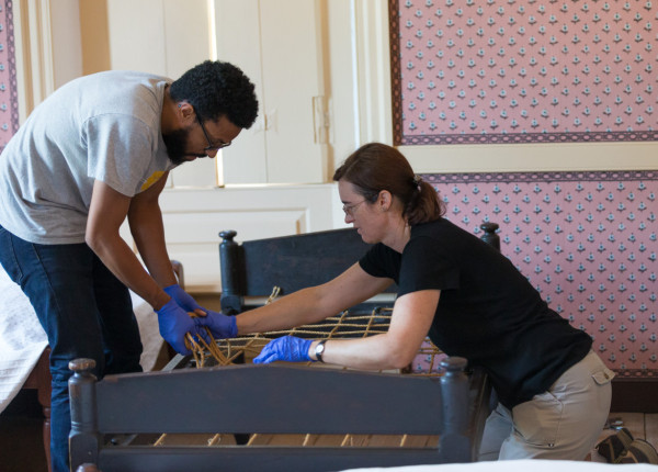 Conservation staff works to convert the Wythe House into Washington's Headquarters