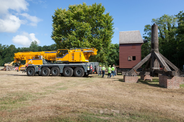 A 180-ton crane arrives at Great Hopes Plantation to lift the mill house on to its post.