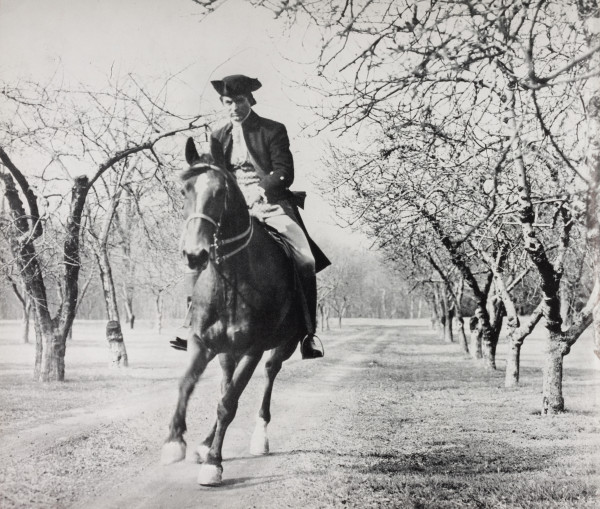 Illustration, Cary Grant in his leading role as Matt Howard riding a horse in the motion picture “Howards of Virginia” p. 2, “The Howards of Virginia” New York: Columbia Pictures Corporation, 1940.