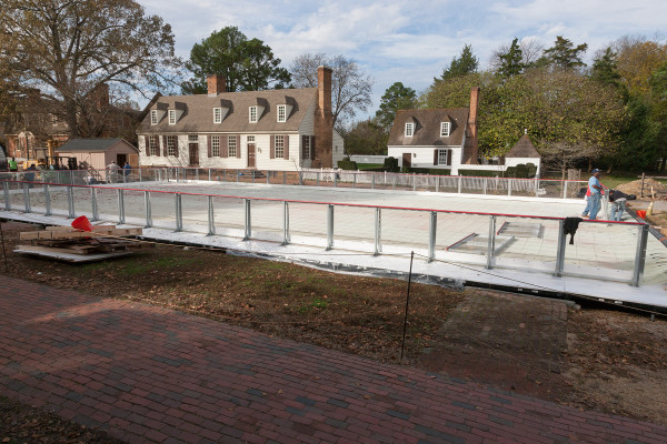 Progress photos of setting up the ice skating rink on DoG street.