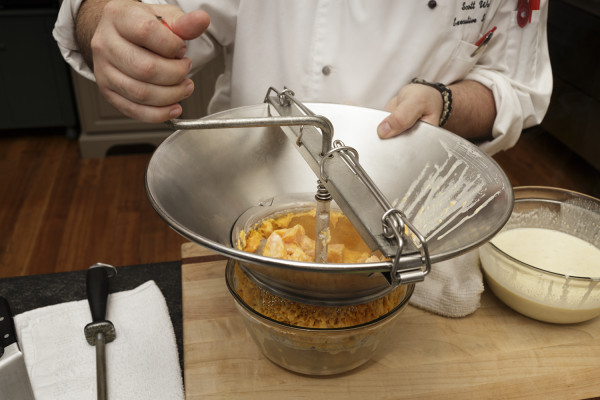 Chef Scott Waton making whipped creamsicle sweet potatoes in the Taste Studio