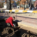 Archaeologist Mark Kostro excavates the site of the James Slate tenement on Duke of Gloucester St. Dec . 2015