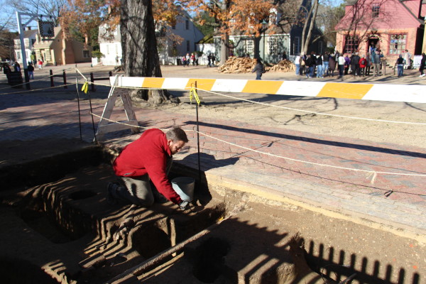 Archaeologist Mark Kostro excavates the site of the James Slate tenement on Duke of Gloucester St. Dec . 2015