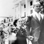 Child star Shirley Temple walks with her father George in front of the Williamsburg Inn in 1938.