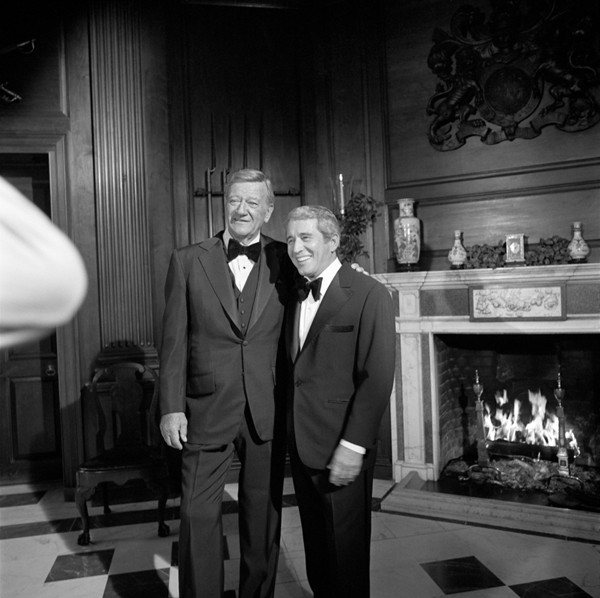 Perry Como and John Wayne in the Governor's Palace during filming of Como's Christmas special, November 1978