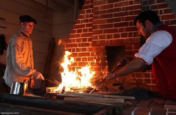 Shoemaker Rob Welch prepares a batch of black ball at Anderson's Blacksmith Shop.