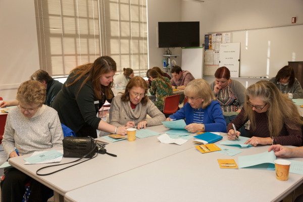 Kelly Govain interacting with employees during training at Bruton Heights School. Photos requested by CWF Social Media.