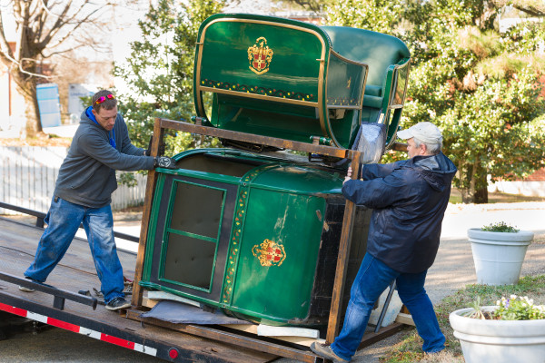 The two bodies for the Randolph Coach are unloaded from a shipping container, Feb. 2, 2016..