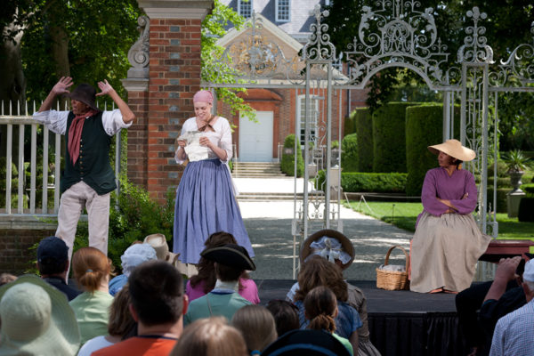 A scene with African American interpreters at the Governors Palace