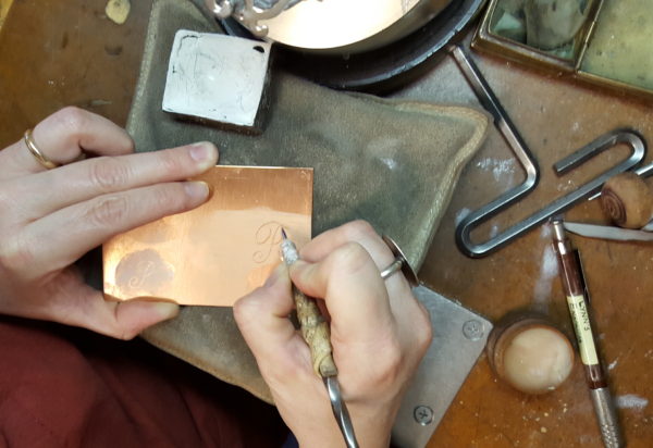 Using a scribe tool to show hand engraving