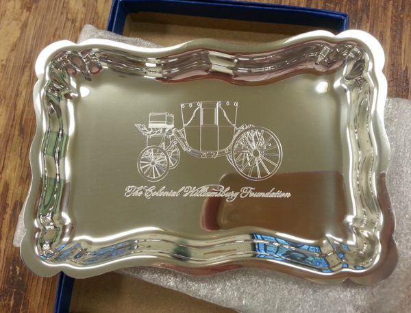 Carriage hand engraved on a tray