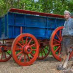 Wheelwright Andrew De Lisle with a newly built wagon