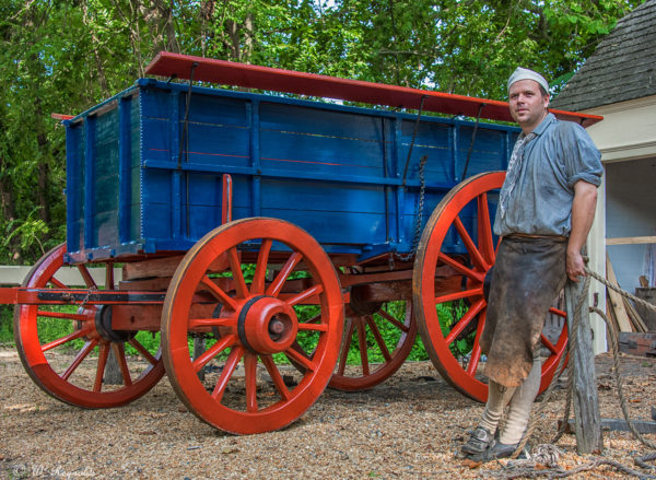 Wheelwright Andrew De Lisle with a newly built wagon