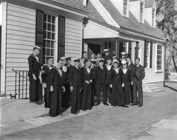 British sailors from warship pose in front of Chowning's Tavern, 1942.