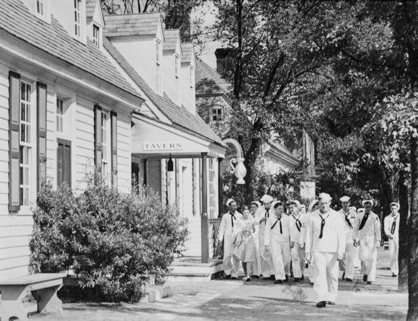 Group of sailors walking past Chownings Tavern, ca. 1942-1943