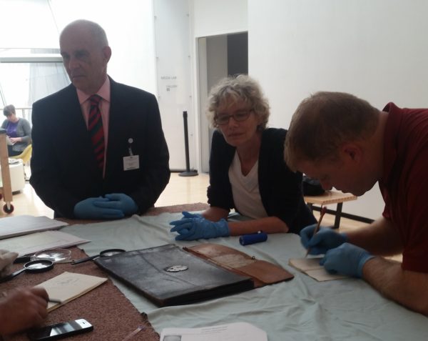 Examining the original Washington portfolio at the Taubman Museum in Roanoke