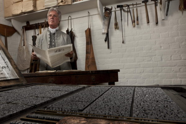 Dennis Watson portrays Alexander Purdie, printer of the Virginia Gazette