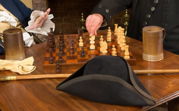 George Washington and Patrick Henry at King's Arms Tavern, moving chess piece