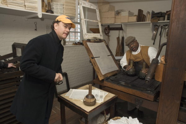 Tom Hanks visits Master Printer Willie Parker during 2005 location scouting visit for John Adams