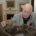 Ivor Noel Hume with mastadon bone at Jefferson's home at Monticello Virginia