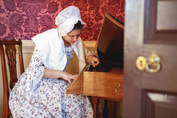 Young woman playing music