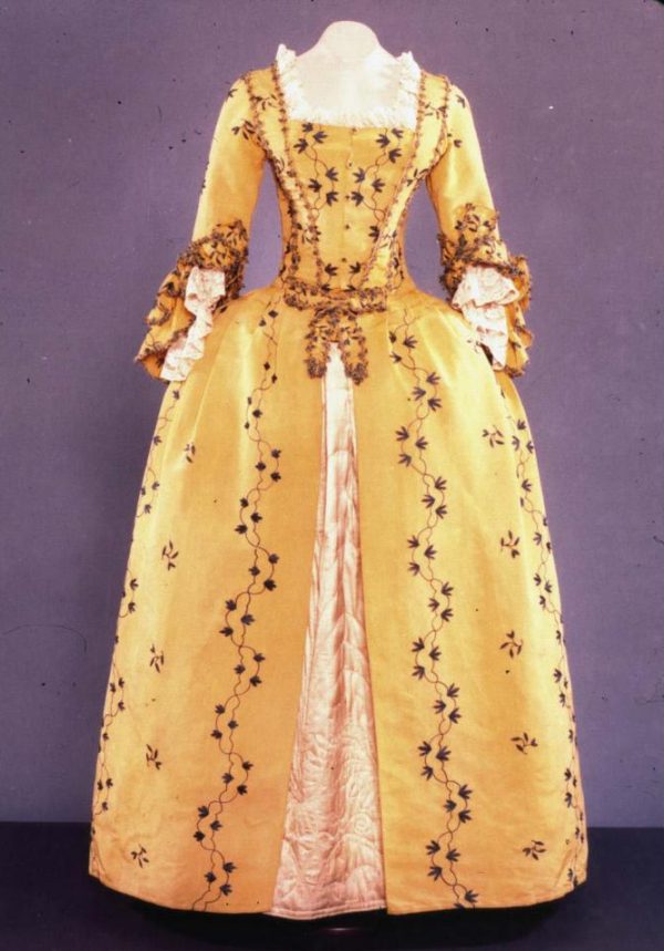 Womans gown embroidered in blue on yellow silk emuseum Acc. No. 1953-850